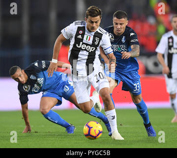 Empoli, Italy. 27th Oct, 2018. Juventus's Paulo Dybala (Front) vies with Empoli's Rade Krunic (3rd L) during the 2018-2019 Serie A soccer match between FC Juventus and Empoli in Empoli, Italy, Oct. 27, 2018. FC Juventus won 2-1. Credit: Alberto Lingria/Xinhua/Alamy Live News Stock Photo