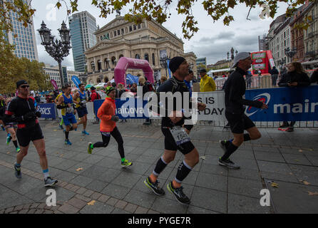 Frankfurt Main, Germany. 28th Oct, 2018. Participants of the Frankfurt Marathon walk past the Alte Oper. The Frankfurt running event is the oldest city marathon in Germany. Credit: Silas Stein/dpa/Alamy Live News Stock Photo