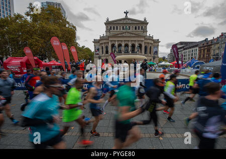 Frankfurt Main, Germany. 28th Oct, 2018. Participants of the Frankfurt Marathon walk past the Alte Oper. The Frankfurt running event is the oldest city marathon in Germany. Credit: Silas Stein/dpa/Alamy Live News Stock Photo