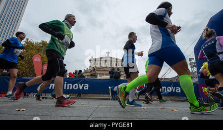 Frankfurt Main, Germany. 28th Oct, 2018. Participants of the Frankfurt Marathon walk past the Alte Oper. The Frankfurt running event is the oldest city marathon in Germany. Credit: Silas Stein/dpa/Alamy Live News Stock Photo