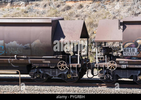 Empty rail freight coal carriages parked just outside Lithgow railway station on the western side of the Blue Mountains, two hours from Sydney Stock Photo