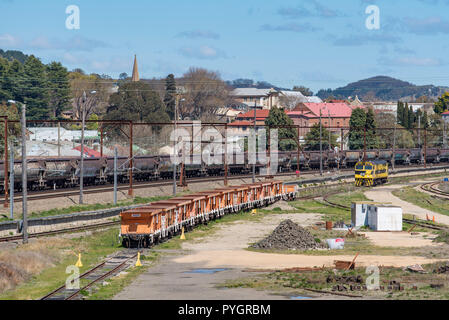 Empty rail freight coal carriages parked just outside Lithgow railway station on the western side of the Blue Mountains, two hours from Sydney Stock Photo