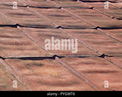 Detail of old metal weathered metal red rusted steel roof Stock Photo