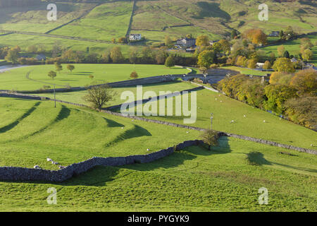View of River Wharfe in valley bottom, Burnsall, Wharfedale, Yorkshire Dales, England, October Stock Photo