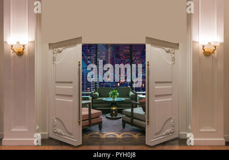 Open door in the Lobby area of a hotel which can see Trading graph on the cityscape at night and world map background, dicut each elements Stock Photo
