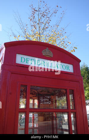 defribillator in classic phonebox, Ticehurst United Kingdom Stock Photo