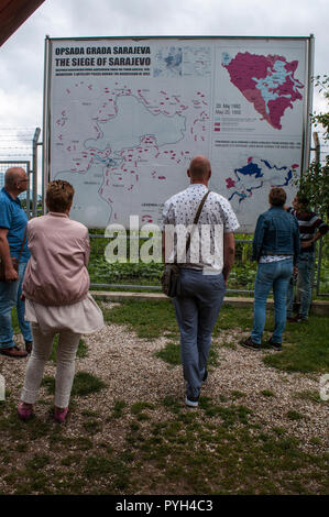 Watching the map of the Siege of Sarajevo in the courthouse of Kolar family house, now Sarajevo Tunnel Museum housing the 1993 underground tunnel Stock Photo