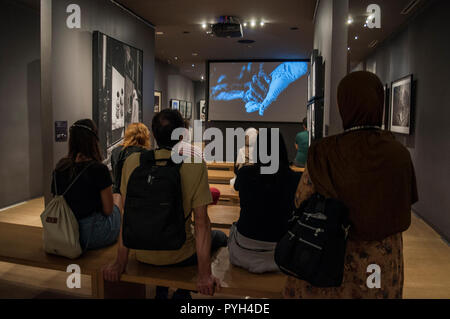 Sarajevo: watching a documentary with the testimonies of the survivors and the story of the Srebrenica massacre, the July 1995 Bosniaks genocide Stock Photo