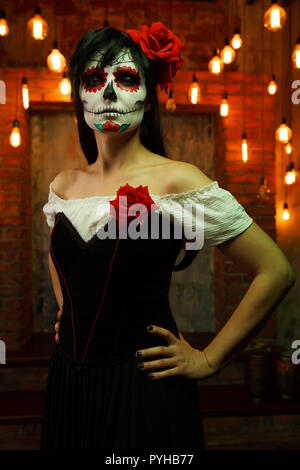 Image of halloween woman with white make-up on her face Stock Photo