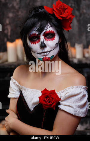 Portrait of zombie woman with grim bodypainting on face Stock Photo