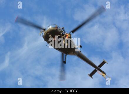 Close up of an Alouette III of the austrian air force during a recovery display on the 26th of October 2018 ( Nationalfeiertag) from below. Stock Photo