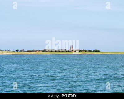 View of church of Hollum and coast of Ameland island in Wadden Sea, Friesland, Netherlands Stock Photo