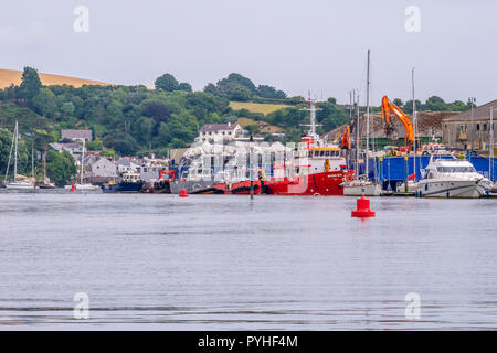 A scene featuring boats, yachts and craft, moored on the Penryn River, Falmouth, Cornwall, UK. Stock Photo