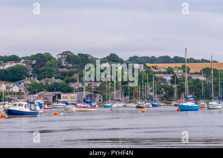 A scene featuring boats, yachts and craft, moored on the Penryn River, Falmouth, Cornwall, UK. Stock Photo