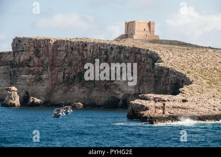 Around Malta - St Mary’s Tower, Comino captured from the ferry to Gozo Stock Photo