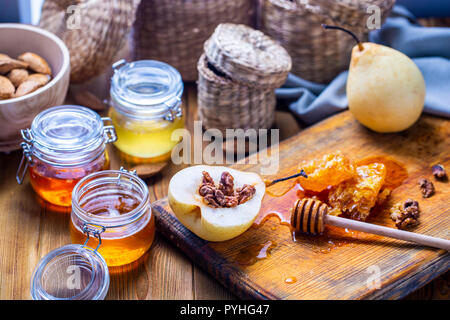 Sweet baked pears with honey, walnuts Stock Photo