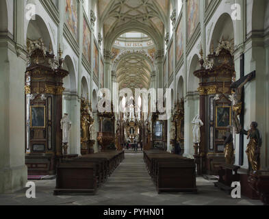 Interior of the main nave of the Assumption Church (Kostel Nanebevzetí Panny Marie) of the Kladruby Monastery (Klášter Kladruby) in Kladruby near Tachov in West Bohemia, Czech Republic. The monastery church designed by Czech architect with Italian origins Jan Santini Aichel (Giovanni Biagio Santini) was built from 1712 to 1721 in the combination of Baroque and Gothic styles, known as Baroque Gothic style. Stock Photo