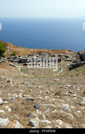 Overlooking the Aegean Sea, the Ancient theatre, constructed in the 2nd century BC, Ancient Thera, Santorini, Greece. The theatre had a capacity to se Stock Photo