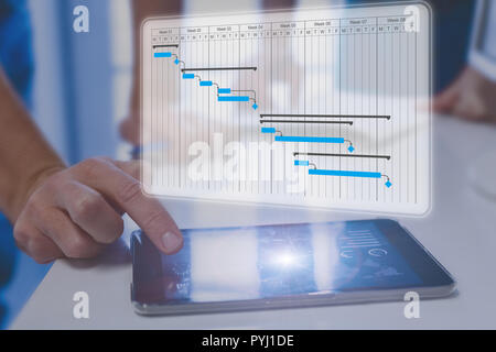 Project manager using Gantt chart schedule to discuss tasks, milestones and deliverables progress with stakeholders, digital planning floating above t Stock Photo