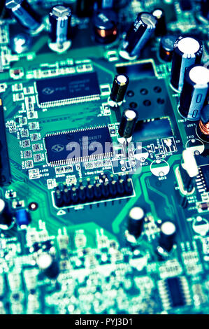 detail of a computer motherboard or printed circuit board containing the principal components of a computer Stock Photo