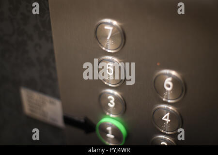 Details with the braille floor buttons on a modern elevator in a luxury hotel Stock Photo