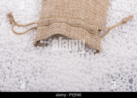 Little sack in White polystyrene foam balls as background Stock Photo ...