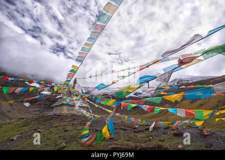 Mountain landscape and prayer flags in Tibet Stock Photo