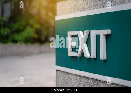 Closeup exit door Emergency Fire exit sign in condo Stock Photo