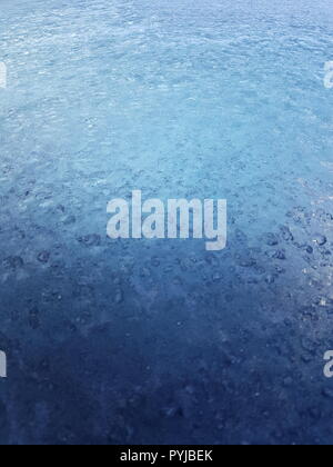 Frost Pattern on Frozen Glass Focused on Background Stock Photo