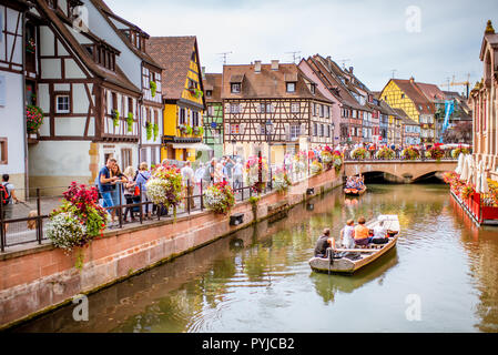 COLMAR, FRANCE - September 10, 2017: Cityscaspe view on the old town with beautiful half-timbered houses and water canal in Colmar, famous french town in Alsace region Stock Photo