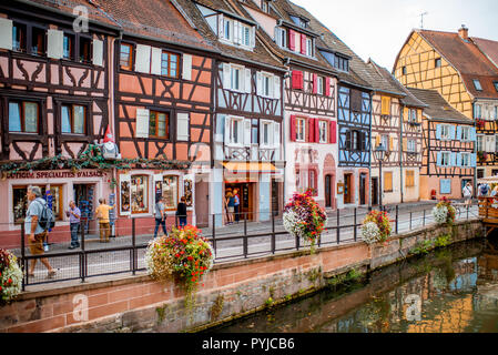 COLMAR, FRANCE - September 10, 2017: Cityscaspe view on the old town with beautiful half-timbered houses and water canal in Colmar, famous french town in Alsace region Stock Photo