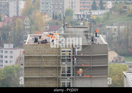 Workers renovating and old storey house - scene from above Stock Photo