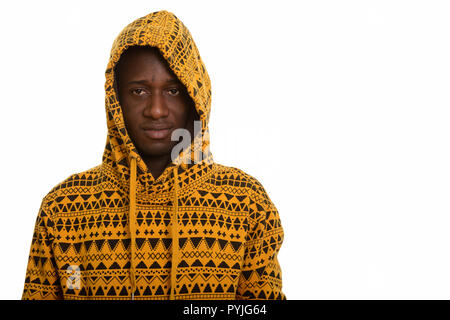Young handsome African man wearing yellow hoodie Stock Photo