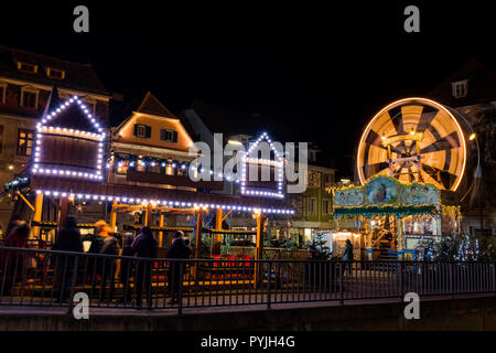 Old spinning ferris wheel on childrens christmas fair in Graz, Styria Austria Stock Photo