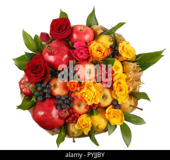 Bouquet consisting of pomegranates, apples, black rowan, red viburnum, pears, lemons and flowers of red and yellow roses on white background Stock Photo