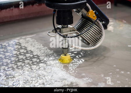 Precision 5 axis cutting head with direct drive technology Stock Photo