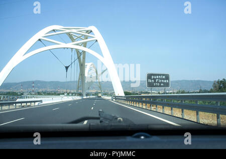 Cordoba, Spain - 2018 july 10th: Driving by Ibn Abbas Firnas Bridge close to Cordoba City. View from the inside of the car. Designed by JL Manzanares  Stock Photo