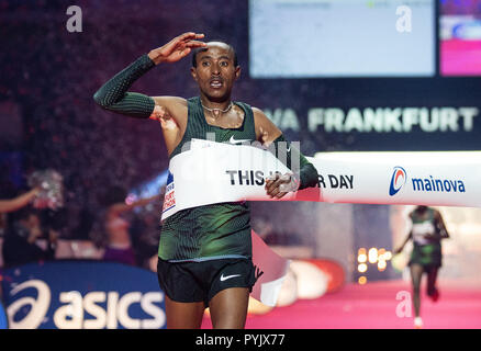 Frankfurt Main, Germany. 28th Oct, 2018. Kelkile Gezahegn from Ethiopia is the first man to cross the finish line at the Frankfurt Marathon 2018. The Frankfurt running event is the oldest city marathon in Germany. Credit: Silas Stein/dpa/Alamy Live News Stock Photo