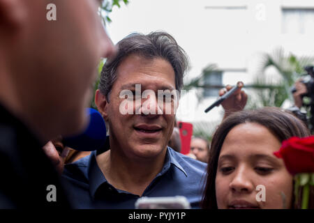 Rio De Janeiro, Brazil. 28th Oct, 2018. Fernando Haddad, presidential candidate of the left-wing Workers' Party (PT), casting his vote in a polling station. The presidential election has begun in Brazil. Credit: Warley Kenji/dpa/Alamy Live News Stock Photo