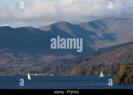 Lake Windermer, UK. 28 October 2018.  Clear sunny day  chilling north wind ideal for sailing .View from Bowness Bay looking up north of the lake with the fells in the background .Credit:Gordon Shoosmith/Alamy Live News Stock Photo
