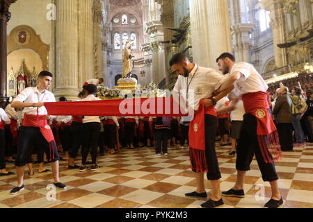 Malaga, Spain. 28 October 2018.  This Sunday, the Glorias Grouping celebrated its annual rosary in the Cathedral, presided over by the Virgen del Carmen of El Palo. The image has arrived by boat and will return to its original destination in a jabega also by the sea. Credit: Lorenzo Carnero/ZUMA Wire/Alamy Live News Stock Photo