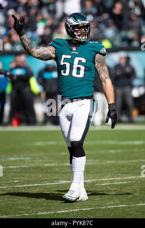 Philadelphia Eagles defensive end Chris Long 56 celebrates as he wears a dog mask after the Eagles defeated the Minnesota Vikings 38 7 to win the NFC Championship at Lincoln Financial Field in