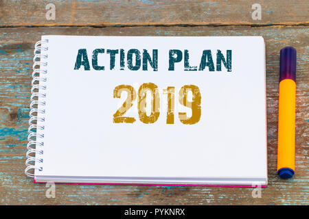 top view image of open notebook with blank pages on wooden table. ready for adding text or mockup. Stock Photo