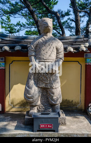 Stone sculpture representing the rat deity from the Chinses Zodiac, seen here at Haedong Yonggung Temple, Busan, South Korea. Stock Photo