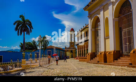 TRINIDAD, CUBA - MAY 25, 2014: Unidentified people on the street of Trinidad, Cuba. Trinidad has been a UNESCO World Heritage site since 1988. Stock Photo