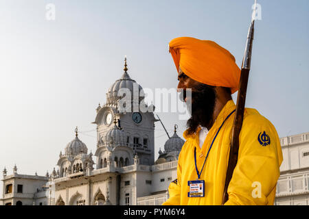 Guard taking care of the Golden Temple Complex Stock Photo