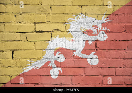 Bhutan flag is painted onto an old brick wall Stock Photo - Alamy