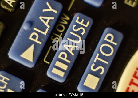 play and pause buttons on a TV remote Stock Photo