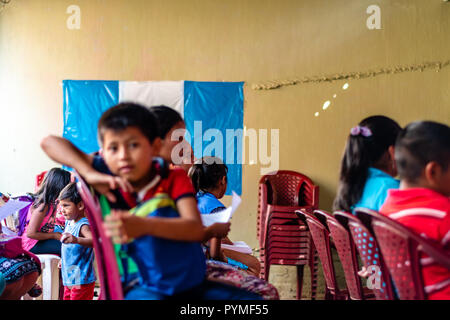 kids and parents at meeting in Guatemala Stock Photo
