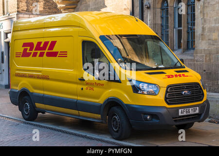 DHL express delivery van on parked the street. UK. Stock Photo